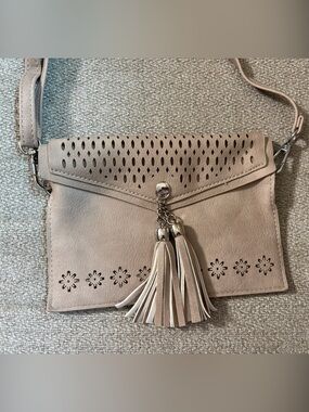 Neutral Beige Tassel Crossbody Bag with Laser-Cut Accents